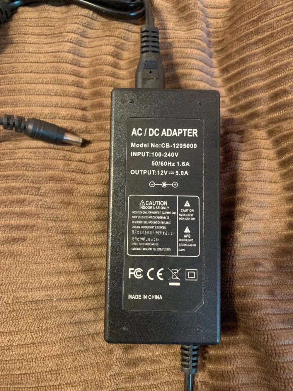 AC/DC Adapter Output: 12V 5.0A Input: 100-240V 50/60Hz 1.6A